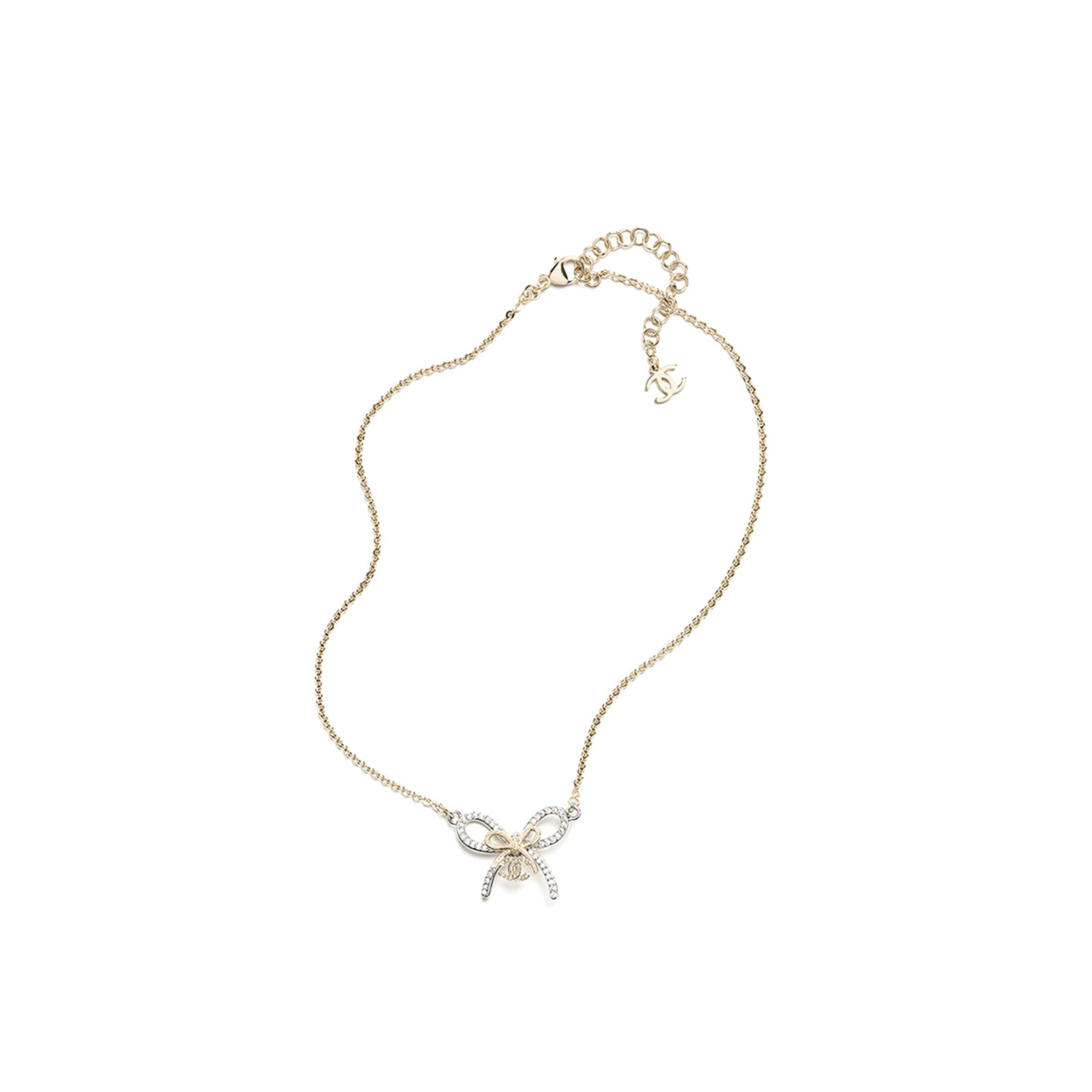 Ch**el pendant necklace metal & diamantÉs silver, gold & crystal abg588